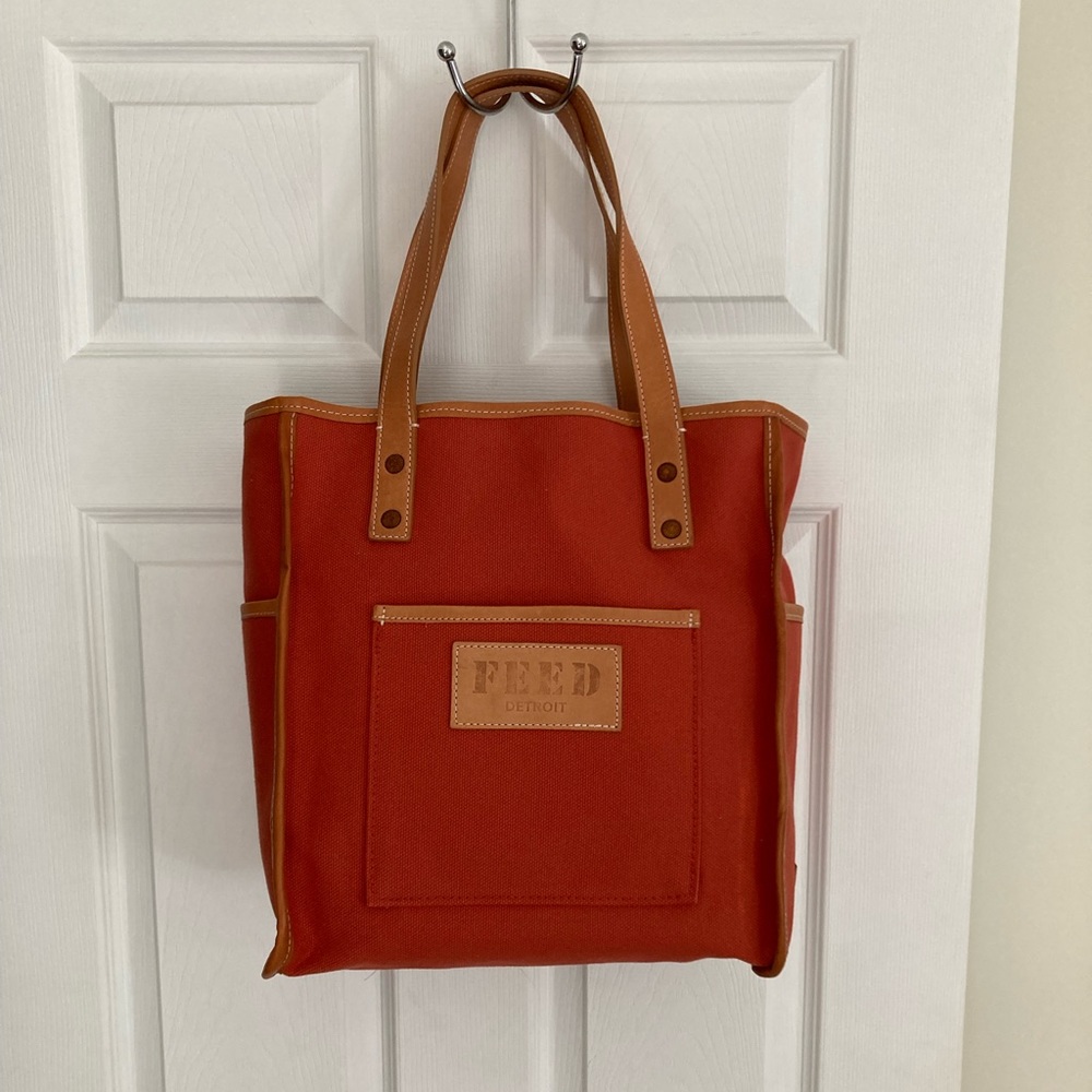 The Feed x Shinola limited edition tote bag in Sunset Orange